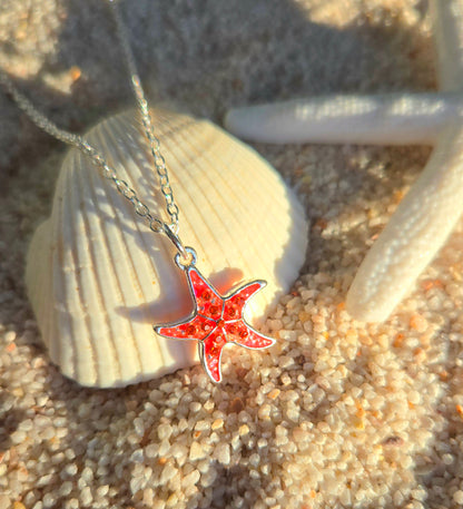 Cadena diseño estrella de mar color anaranjada, decorada con cristales